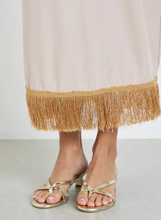 Styli Women Beige Midi Skirt with Tassel Hem